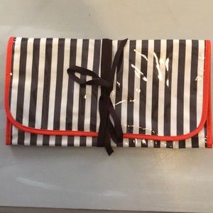 Henri Bendel Jewelry roll case.